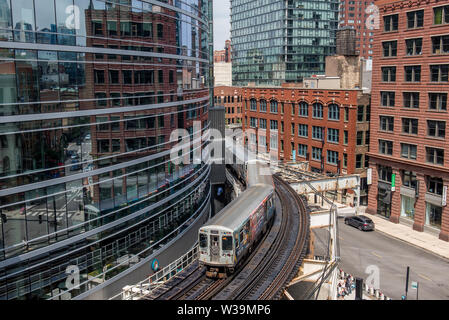 view of Chicago EL train from Wells Kinzie parking Garage near merchandise mart station Stock Photo