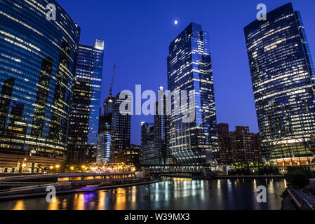 view of sky scrapers,  river and west lake street bridge from Franklin–Orleans Street Bridge at blue hour Stock Photo