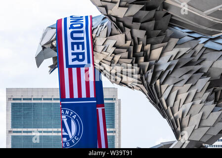 Atlanta United FC shawl draped over the giant falcon sculpture at Mercedes-Benz Stadium, home of the Atlanta United soccer team, in Atlanta, GA. (USA) Stock Photo