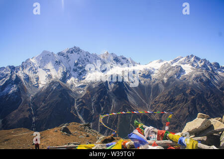 Tsergo Ri (4984M) sits immediately above Kyanjin Gompa, Langtang Valley with the awe-inspiring magnificent views of glaciers and the Himalayas. Stock Photo