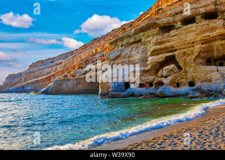 Matala beach cliff with caves, Crete island, Greece Stock Photo