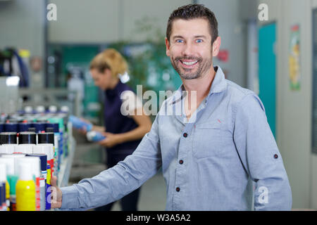 hardware store worker counting stock Stock Photo