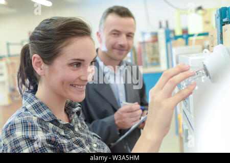 woman buying energy-saving light bulb in the store Stock Photo