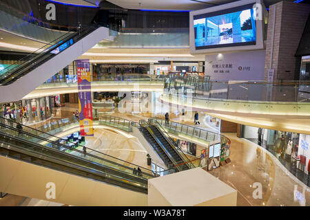 Interior of the O'Plaza shopping mall at OCT Harbour. Shenzhen, Guangdong Province, China. Stock Photo