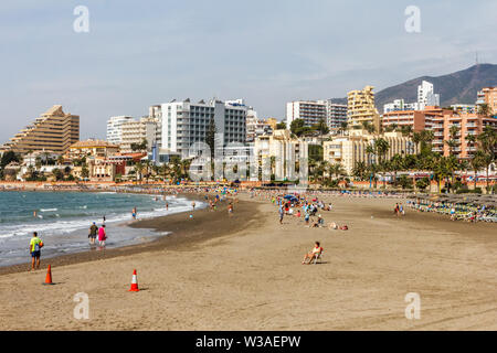 Benalmadena, Spain - September 4th 2015: People on the beach on a sunny day. THe area is a popular holiday destination. Stock Photo
