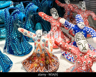 Porcelain figures of Turkish folk dancers, a traditional 'sufi whirling' dance with mediation. Nice gift in a shop as souvenir of Turkey Stock Photo