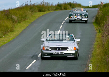 1992 Mercedes 300Sl-24 Auto at Scorton, Lancashire. Lancashire Car Club Rally Coast to Coast crosses the Trough of Bowland. 74 vintage, classic, collectible, heritage, historics vehicles left Morecambe heading for a cross county journey over the Lancashire landscape to Whitby. A 170 mile trek over undulating landscape as part of the classics on tour car club annual event. Stock Photo