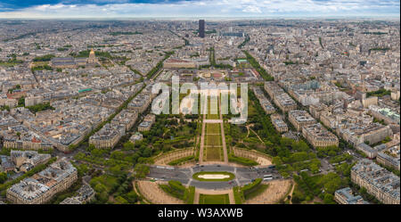 Perfect aerial panorama of the Champ de Mars park, the École Militaire building behind, the Les Invalides building complex with the golden dome and in... Stock Photo