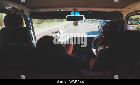 friends driving in van in Western Australia, Australia Stock Photo