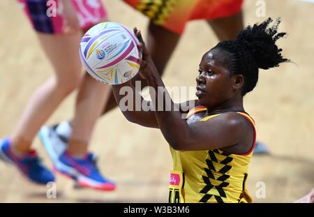 Liverpool, UK. 14 July 2019. Ruth Meeme (Uganda) during the Preliminary game between Uganda and Scotland at the Netball World Cup. M and S arena, Liverpool. Merseyside. UK. Credit Garry Bowdenh/SIP photo agency/Alamy live news.