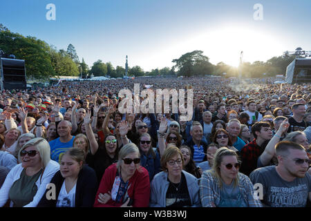 Swansea, UK. 13th July, 2019. Music fans in the crowd. Re: Stereophonics live concert at the Singleton Park in Swansea, Wales, UK. Credit: ATHENA PICTURE AGENCY LTD/Alamy Live News Stock Photo