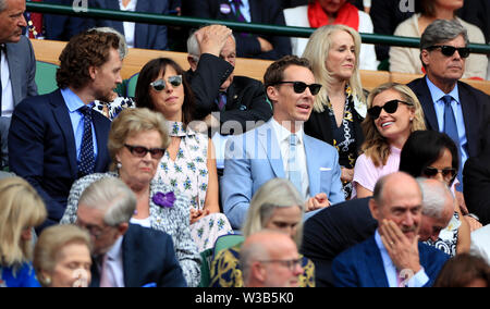 Tom Hiddleston, Sophie Hunter, Benedict Cumberbatch and Katherine Jenkins on day thirteen of the Wimbledon Championships at the All England Lawn Tennis and Croquet Club, Wimbledon. Stock Photo