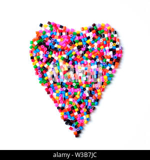 Plastic mosaic heart. Multi-colored children's mosaic Stock Photo