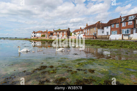 View at low tide of the small village of Bosham near Chichester at Bosham Quay (Bosham or Chichester Harbour) in West Sussex, England, UK. Stock Photo