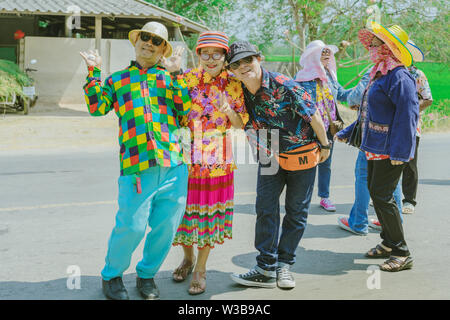 RATCHABURI-Thailand, April 14, 2019 : Unidentified Thai dancers with new monk and music band parade in Buddhist ordination ceremony at local road go t Stock Photo