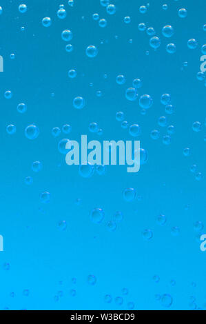 Fresh blue water bubbles backround, close-up Stock Photo