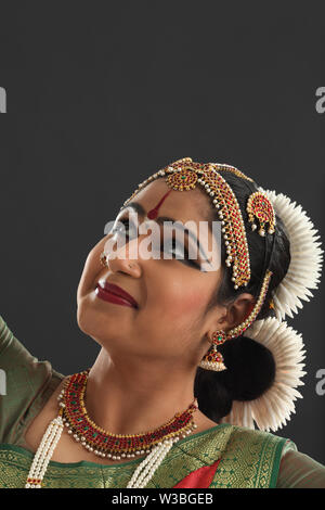 Indian woman performing Bharatanatyam dance Stock Photo