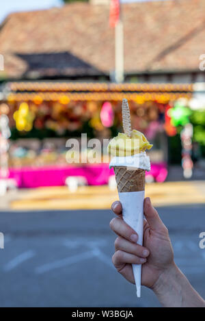 A beautiful ice cream cone at a summer fair in Switzerland Stock Photo