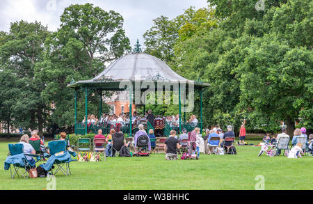 Northampton, UK. 14th July 2019. Light Clouds giving a warmish Sunday afternoon for people in Abington Park having a picknic and enjoy the Band in the Park, which is on every Sunday between 2 to 5 pm, a different band plays each week from April to September, the band today is Corby Steel Band. Credit: Keith J Smith./Alamy Live News. Stock Photo