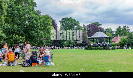 Northampton, UK. 14th July 2019. Light Clouds giving a warmish Sunday afternoon for people in Abington Park having a picknic and enjoy the Band in the Park, which is on every Sunday between 2 to 5 pm, a different band plays each week from April to September, the band today is Corby Steel Band. Credit: Keith J Smith./Alamy Live News. Stock Photo