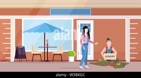 girl giving money to sad woman beggar holding sign board with hungry text girl tramp begging for help homeless concept cafe building exterior flat Stock Vector