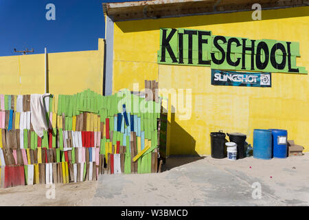 kite school sign on a wall made of colorful wooden batten Stock Photo