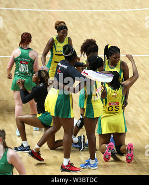 Zimbabwe's players celebrate their victory over Northern Ireland during the Netball World Cup match at the M&S Bank Arena, Liverpool. Stock Photo