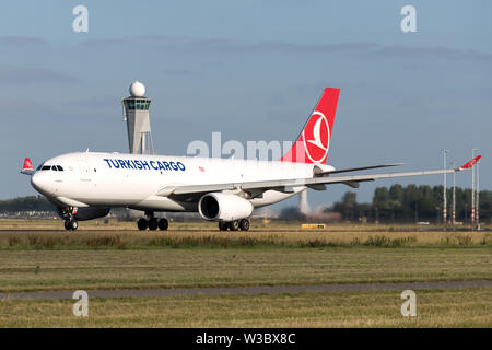 Turkish Cargo Airbus A330-200F with registration TC-JOV on take off roll on runway 36L (Polderbaan) of Amsterdam Airport Schiphol. Stock Photo