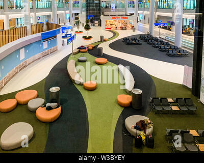 Interior design with many passenger seats of the New Airport (IST) that freshly opened and replaces Ataturk International Airport. Istanbul/ Turkey - Stock Photo