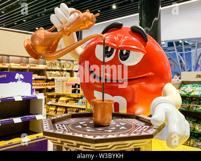 M&M mascot figure pouring Turkish coffee in a mug. Adaption of candy advertising of the company MARS for different regions and countries. Istanbul, Tu Stock Photo