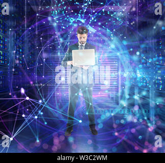 Businessman works at a data center room with database server and network effects. Stock Photo