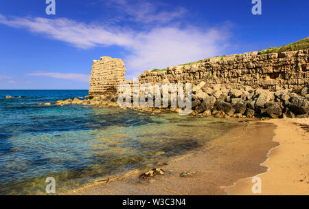 Remains of an ancient Messapian wall in the marine area of Gnatia (Egnazia). Stock Photo