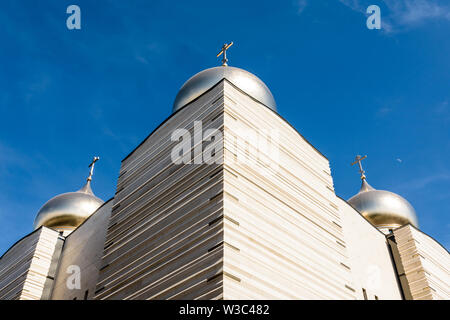 The Holy Trinity Cathedral is a modern Orthodox cathedral, topped by five golden onion domes with orthodox crosses, opened in 2016 in Paris, France. Stock Photo
