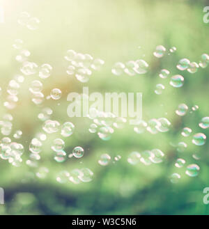 rainbow bubbles from the bubble blower Stock Photo