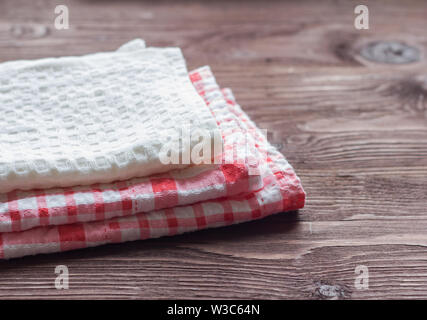 stack of kitchen towels on wooden background Stock Photo