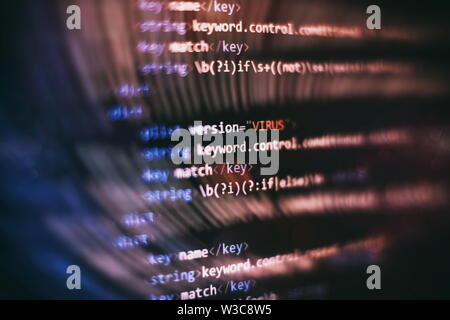 Website HTML Code on the Laptop Display Closeup Photo. Desktop PC monitor photo. Javascript functions, variables, objects. Stock Photo