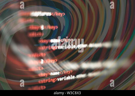 Website HTML Code on the Laptop Display Closeup Photo. Desktop PC monitor photo. Javascript functions, variables, objects. Stock Photo