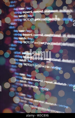 Website HTML Code on the Laptop Display Closeup Photo. Desktop PC monitor photo. Javascript functions, variables, objects. Stock Photo