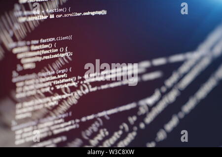 Website HTML Code on the Laptop Display Closeup Photo. Desktop PC monitor photo. Javascript functions, variables, objects. Stock Photo