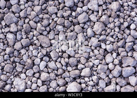 Texture background of many small gray stones. Stock Photo