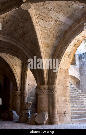 Rhodes Old City, Greece - September 26, 2018. Detail of gothic loggiato in the main courtyard of historic Knight hospital  today Archaeological Museum Stock Photo