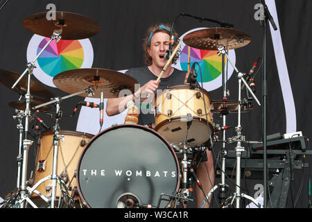 Glasgow, Scotland, UK. 14th July 2019.  Thousands of spectators turned out on the third day of the TRNSMT music festival held in Glasgow Green public park in the centre of Glasgow. The capacity 'sell out' crowd were entertained by many famous bands and singers including THE WOMBATS pictured here. Credit: Findlay/Alamy Live News Stock Photo