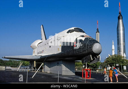 A mock-up of a Space Shuttle orbiter designed to transport astronauts and cargo to and from the International Space Station circling our planet was on display outdoors at the Kennedy Space Center near Cape Canaveral in Florida, USA, when this photograph was taken in 1976. The Ambassador was a full-size replica of six rocket-boosted shuttles that made 135 flights while being operated by the United States National Aeronautics and Space Administration (NASA) from 1981 to 2011. Nowadays the last of those retired space shuttles to fly, the Atlantis, is on exhibit at the Kennedy Space Center. Stock Photo