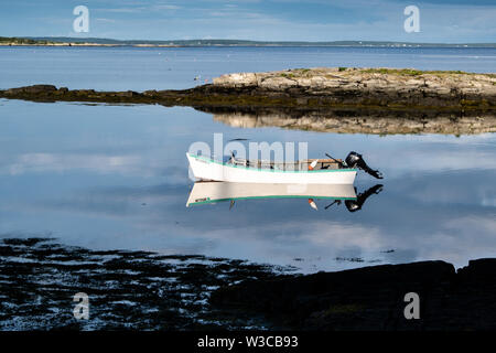 A dinghy tied up in Wills Gut on Bailey Island in Harpswell, Maine. Stock Photo