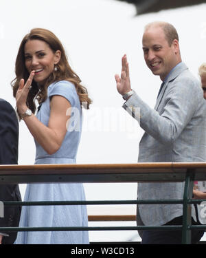 London, UK. 14th July, 2019. LONDON, ENGLAND - JULY 14: Catherine, Duchess of Cambridge and Prince William, Duke of Cambridge in the Royal Box on Centre court during Men's Finals Day of the Wimbledon Tennis Championships at All England Lawn Tennis and Croquet Club on July 14, 2019 in London, England. People: Catherine, Duchess of Cambridge and Prince William, Duke of Cambridge Credit: Storms Media Group/Alamy Live News Stock Photo