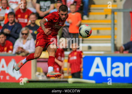 Bradford, UK. 14th July, 2019. 14th July 2019, Northern Commercials Stadium, Bradford, England; Pre-Season Friendly, Bradford City v Liverpool ; Adam Lallana (20) of Liverpool crosses the ball Credit: Craig Milner/News Images English Football League images are subject to DataCo Licence Credit: News Images /Ģ����ý Live News Stock Photo