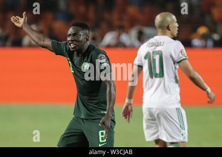 Cairo, Egypt. 14th July, 2019. Nigeria's Oghenekaro Etebo reacts during the 2019 Africa Cup of Nations semi-final soccer match between Algeria and Nigeria at the Cairo International Stadium. Credit: Oliver Weiken/dpa/Alamy Live News Stock Photo