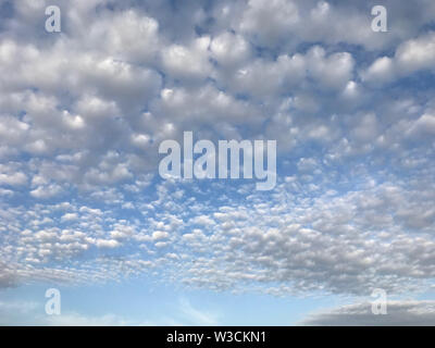 Moving clouds and blue sky Stock Photo