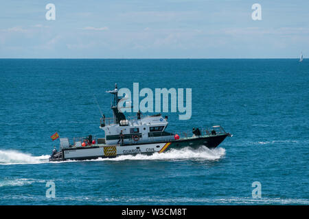 Police coast guard vessel patrolling at Singapore River, a bum boat ...