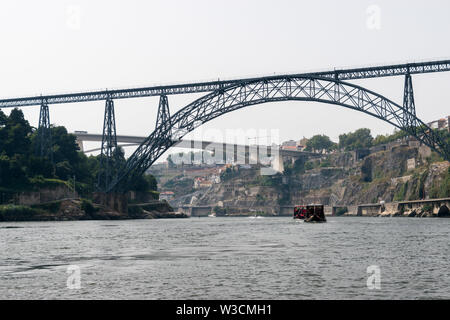 The Maria Pia Bridge (Ponte de D. Maria Pia), railway bridge over the Douro River in Porto, Portugal Stock Photo